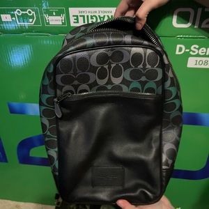 Coach sling backpack